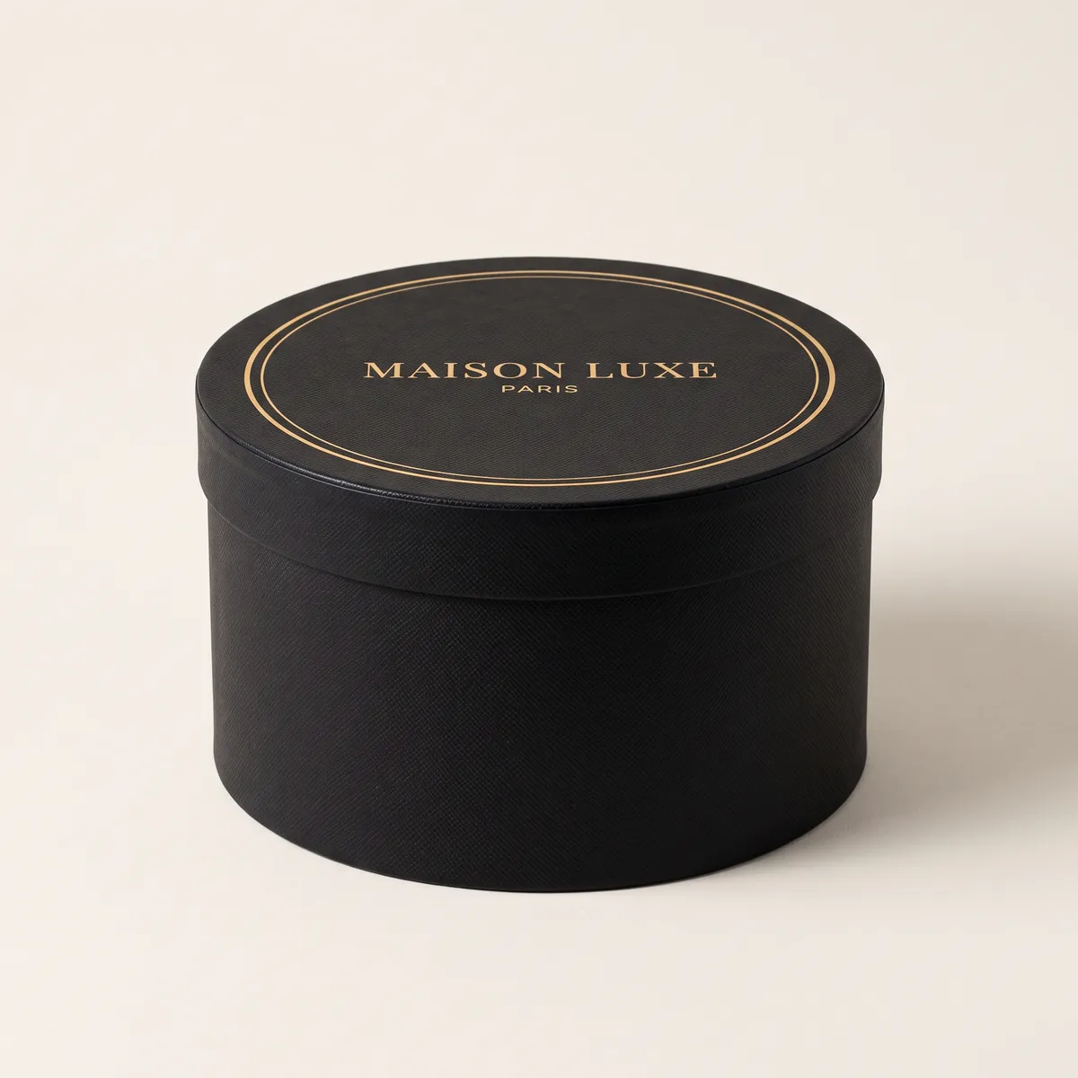 Custom Black Round Box by Packaging Hippo